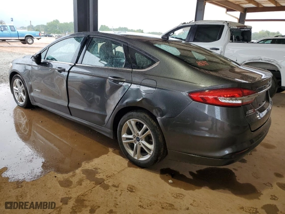 2018 Ford Fusion Hybrid S with VIN 3FA6P0UU6JR142119, listed as a Copart auction lot 73036474 with 135,839 mi miles and Salvage Title. Bid and sale history available at carsss.com. Image 2.
