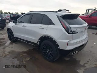 2024 Cadillac XT4 FWD Sport with VIN 1GYFZER42RF246488, listed as a IAAI auction lot 42029551 with 6,476 mi miles and . Bid and sale history available at DreamBid. Image 3.