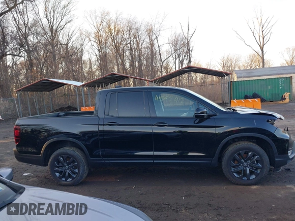 2024 Honda Ridgeline Sport with VIN 5FPYK3F14RB012334, listed as a IAAI auction lot 41542412 with 1,817 mi miles and . Bid and sale history available at DreamBid. Image 13.