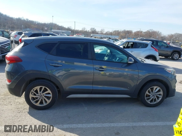 2017 Hyundai Tucson SE Plus with VIN KM8J33A40HU459575, listed as a IAAI auction lot 41703139 with 189,955 mi miles. Bid and sale history available at carsss.com. Image 13.