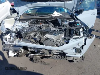 2023 Honda Civic Sport z VIN 2HGFE2F50PH556813, wystawiony jako IAAI lot #41364523 z przebiegiem 8 999 mil mil oraz . Historia ofert i sprzedaży dostępna na DreamBid. Obrazek 18.