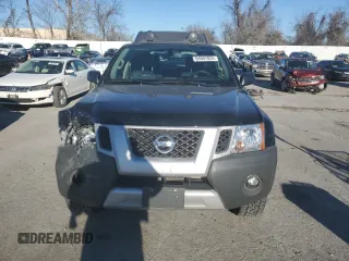 2013 Nissan Xterra S z VIN 5N1AN0NW6DN825399, wystawiony jako Copart lot #84597824 z przebiegiem 79 121 mil mil oraz Szkoda całkowita • Salvage title. Historia ofert i sprzedaży dostępna na DreamBid. Obrazek 5.