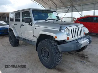 2012 Jeep Wrangler Unlimited Sahara with VIN 1C4BJWEGXCL251433, listed as a IAAI auction lot 42438332 with 72,980 mi miles and . Bid and sale history available at DreamBid. Image 1.