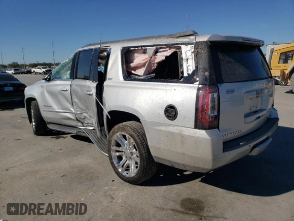2019 GMC Yukon XL SLT with VIN 1GKS1GKC5KR409622, listed as a Copart auction lot 85703104 with 0 mi miles and Salvage Title. Bid and sale history available at carsss.com. Image 2.
