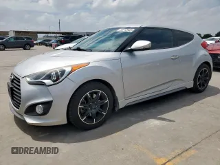 2013 Hyundai Veloster Turbo z VIN KMHTC6AE6DU168222, wystawiony jako Copart lot #59712905 z przebiegiem 119 657 mil mil oraz Czysty tytuł • Clean title. Historia ofert i sprzedaży dostępna na DreamBid. Obrazek 1.