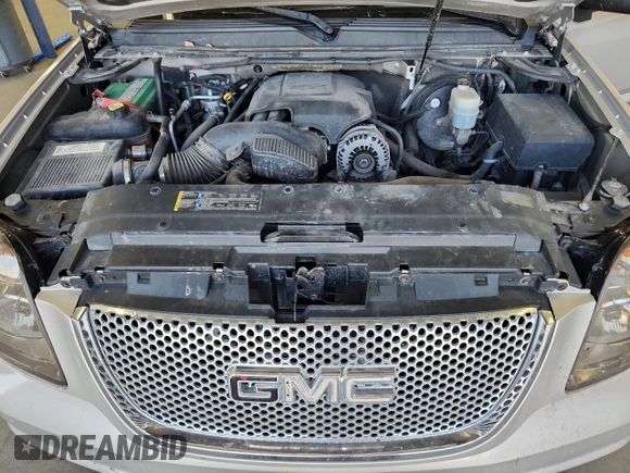 2007 GMC Yukon Denali z VIN 1GKFK63867J362741, wystawiony jako Copart lot #59442875 z przebiegiem 198 247 mil mil oraz Czysty tytuł • Clean title. Historia ofert i sprzedaży dostępna na DreamBid. Obrazek 12.