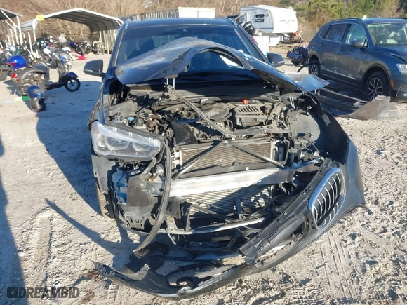2019 BMW X1 sDrive28i with VIN WBXHU7C52K5L11560, listed as a IAAI auction lot 41354422 with 115,401 mi miles. Bid and sale history available at carsss.com. Image 6.