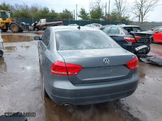 2013 Volkswagen Passat SE w/Sunroof with VIN 1VWBH7A38DC002096, listed as a IAAI auction lot 41904594 with 134,738 mi miles. Bid and sale history available at carsss.com. Image 3.
