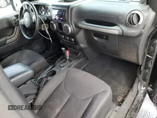 2014 Jeep Wrangler Sport with VIN 1C4AJWAG8EL159953, listed as a Copart auction lot 61175035 with 137,480 mi miles and Salvage title. Bid and sale history available at DreamBid. Image 8.