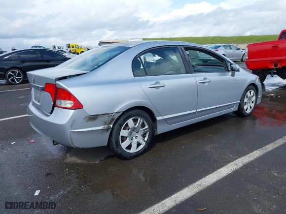 2011 Honda Civic Sdn LX with VIN 2HGFA1F59BH304380, listed as a IAAI auction lot 41936278 with 223,973 mi miles. Bid and sale history available at carsss.com. Image 4.