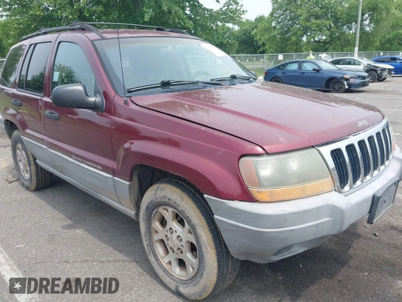 2000 Jeep Grand Cherokee Laredo z VIN 1J4GW48S2YC288439, wystawiony jako IAAI lot #42492798 z przebiegiem 272 527 mil mil oraz . Historia ofert i sprzedaży dostępna na DreamBid. Obrazek 1.