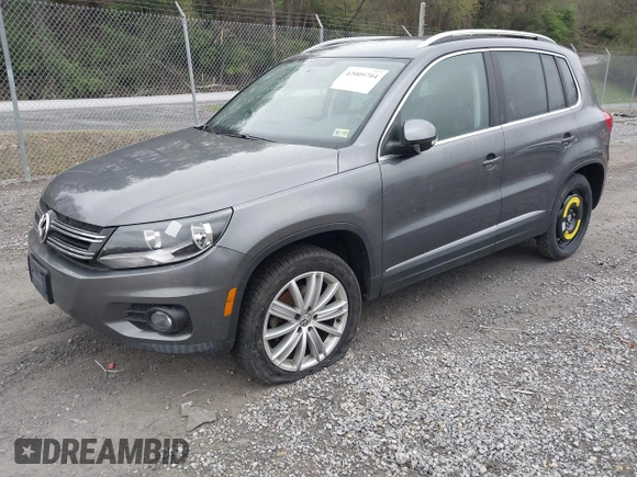 2013 Volkswagen Tiguan SE with VIN WVGAV7AX9DW547633, listed as a IAAI auction lot 42009704 with 51,826 mi miles and . Bid and sale history available at DreamBid. Image 2.