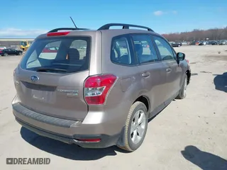 2015 Subaru Forester 2.5i with VIN JF2SJABC1FH577568, listed as a IAAI auction lot 41889849 with 58,479 mi miles. Bid and sale history available at carsss.com. Image 4.