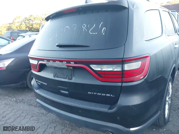 2014 Dodge Durango Citadel with VIN 1C4RDJEG3EC277996, listed as a IAAI auction lot 40517339 with 999,999 mi miles. Bid and sale history available at carsss.com. Image 15.