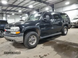 2000 Chevrolet Suburban LT with VIN 3GNGK26U2YG145201, listed as a Copart auction lot 85689134 with 285,624 mi miles and Salvage title. Bid and sale history available at DreamBid. Image 1.