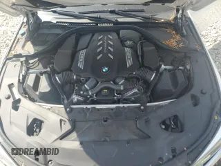 2020 BMW 8 Series M850i z VIN WBAGV8C06LBP48932, wystawiony jako Copart lot #57165015 z przebiegiem 55 731 mil mil oraz Szkoda całkowita • Salvage title. Historia ofert i sprzedaży dostępna na DreamBid. Obrazek 11.