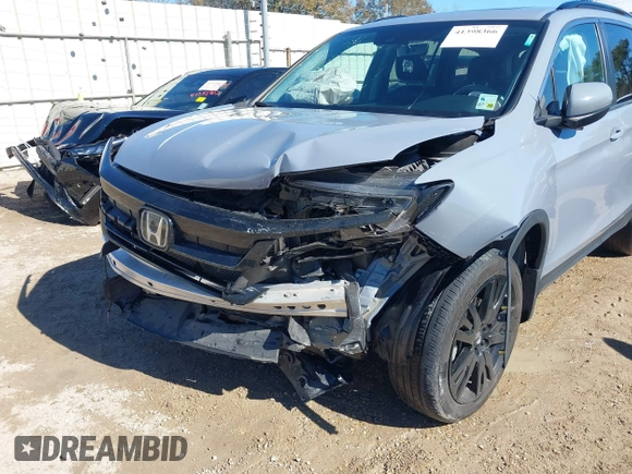 2022 Honda Pilot Special Edition with VIN 5FNYF5H20NB023310, listed as a IAAI auction lot 41398366 with 53,610 mi miles and . Bid and sale history available at carsss.com. Image 6.