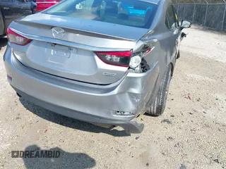 2015 Mazda 6 i Grand Touring with VIN JM1GJ1W52F1195333, listed as a IAAI auction lot 42014865 with 107,039 mi miles and . Bid and sale history available at DreamBid. Image 17.