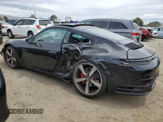2024 Porsche 911 Carrera S with VIN WP0AB2A92RS218949, listed as a Copart auction lot 57306844 with 1,296 mi miles and Salvage Title. Bid and sale history available at carsss.com. Image 2.