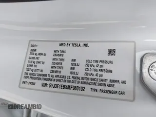 2021 Tesla Model 3 Long Range with VIN 5YJ3E1EBXMF980102, listed as a IAAI auction lot 41944364 with 48,766 mi miles and . Bid and sale history available at carsss.com. Image 9.
