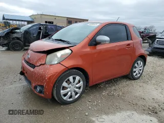 2012 Scion iQ with VIN JTNJJXB01CJ021618, listed as a Copart auction lot 48086424 with 157,609 mi miles and Salvage Title. Bid and sale history available at carsss.com. Image 1.