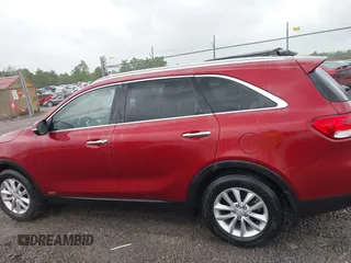2017 Kia Sorento LX z VIN 5XYPGDA30HG314280, wystawiony jako IAAI lot #42224601 z przebiegiem 51 875 mil mil oraz . Historia ofert i sprzedaży dostępna na DreamBid. Obrazek 14.