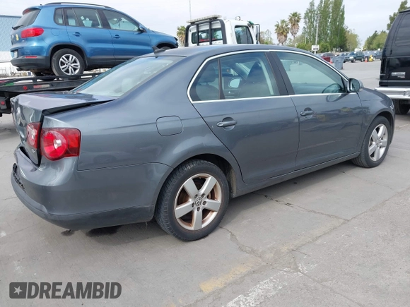 2009 Volkswagen Jetta Sedan SE with VIN 3VWRZ71K49M084983, listed as a IAAI auction lot 42095707 with 154,691 mi miles. Bid and sale history available at carsss.com. Image 4.