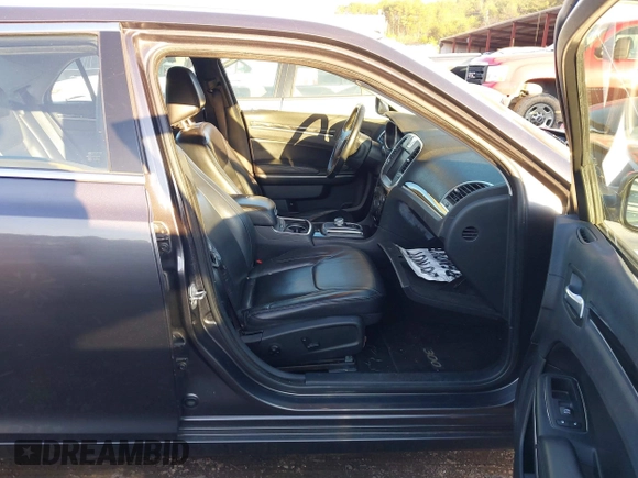 2016 Chrysler 300 Limited with VIN 2C3CCAAG5GH151450, listed as a IAAI auction lot 41253553 with 146,669 mi miles. Bid and sale history available at carsss.com. Image 5.