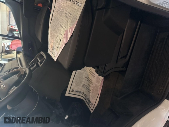 2023 Ford Transit Cargo with VIN 1FTBR1X86PKC09421, listed as a IAAI auction lot 42843981 with 10,233 mi miles and . Bid and sale history available at DreamBid. Image 12.