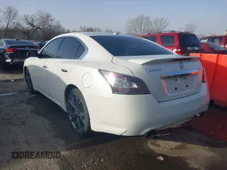 2013 Nissan Maxima SV with VIN 1N4AA5AP4DC821476, listed as a IAAI auction lot 41782887 with 140,956 mi miles and . Bid and sale history available at DreamBid. Image 3.