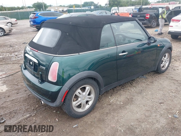 2005 MINI Convertible with VIN WMWRF33495TG11818, listed as a IAAI auction lot 42351446 with 100,033 mi miles and . Bid and sale history available at DreamBid. Image 4.