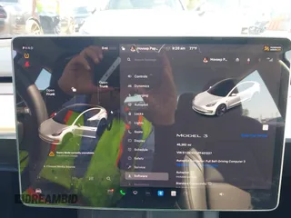 2023 Tesla Model 3 z VIN 5YJ3E1EA5PF401237, wystawiony jako IAAI lot #42520423 z przebiegiem 45 262 mil mil oraz . Historia ofert i sprzedaży dostępna na DreamBid. Obrazek 7.