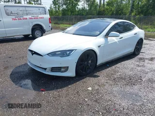 2014 Tesla Model S 60 with VIN 5YJSA1H1XEFP40611, listed as a IAAI auction lot 42826752 with Not provided miles and . Bid and sale history available at DreamBid. Image 18.