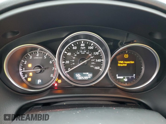 2014 Mazda CX-5 Grand Touring with VIN JM3KE4DY8E0301258, listed as a Copart auction lot 84248134 with 130,599 mi miles and Clean Title. Bid and sale history available at carsss.com. Image 9.