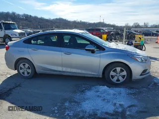 2018 Chevrolet Cruze LS with VIN 1G1BC5SM9J7129241, listed as a IAAI auction lot 41589811 with 66,721 mi miles and . Bid and sale history available at DreamBid. Image 13.