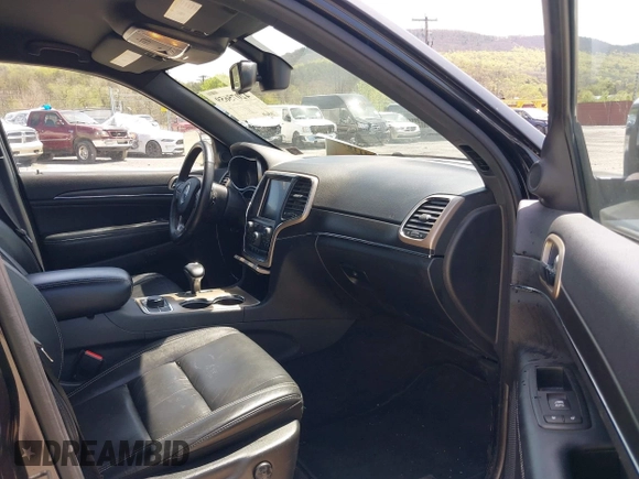 2015 Jeep Grand Cherokee Limited with VIN 1C4RJFBG4FC191141, listed as a IAAI auction lot 42075659 with 135,641 mi miles. Bid and sale history available at carsss.com. Image 5.