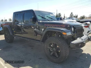 2022 Jeep Gladiator Mojave with VIN 1C6JJTEG4NL150571, listed as a Copart auction lot 54218865 with 26,747 mi miles and Salvage title. Bid and sale history available at DreamBid. Image 4.