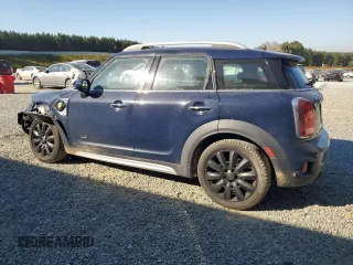2018 MINI Countryman Cooper S E with VIN WMZYU7C47J3E56451, listed as a Copart auction lot 77193144 with 60,949 mi miles and Salvage Title. Bid and sale history available at carsss.com. Image 2.