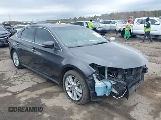 2013 Toyota Avalon XLE with VIN 4T1BK1EB4DU075183, listed as a IAAI auction lot 39466611 with 178,324 mi miles and . Bid and sale history available at DreamBid. Image 1.