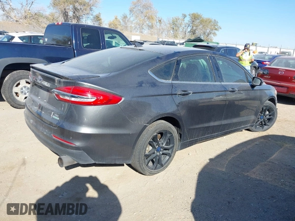 2019 Ford Fusion SE with VIN 3FA6P0HD2KR251012, listed as a IAAI auction lot 40626475 with 60,596 mi miles and . Bid and sale history available at DreamBid. Image 4.