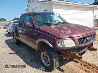 1997 Ford F-150 z VIN 1FTEX08L9VKB68781, wystawiony jako IAAI lot #42158314 z przebiegiem 253 555 mil mil oraz . Historia ofert i sprzedaży dostępna na DreamBid. Obrazek 1.