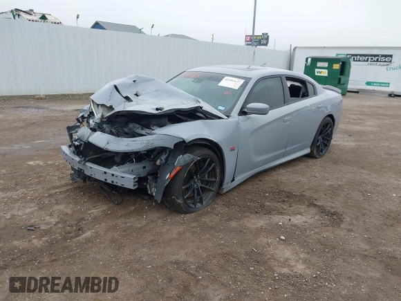 2020 Dodge Charger Scat Pack Widebody z VIN 2C3CDXGJ8LH216563, wystawiony jako IAAI lot #41502637 z przebiegiem Nie podano mil oraz . Historia ofert i sprzedaży dostępna na DreamBid. Obrazek 18.