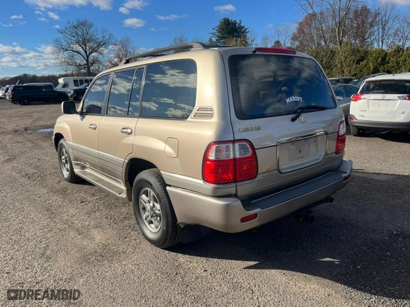 2001 Lexus LX 470 with VIN JTJHT00W013503765, listed as a Copart auction lot 80843654 with 219,615 mi miles and Clean Title. Bid and sale history available at carsss.com. Image 2.
