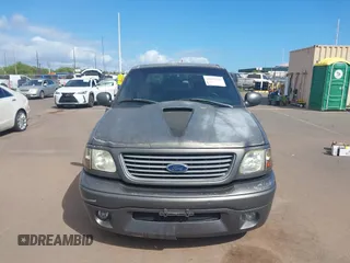2002 Ford F-150 Harley Davidson with VIN 1FTRW07312KC88379, listed as a IAAI auction lot 41657219 with 1 mi miles. Bid and sale history available at carsss.com. Image 12.