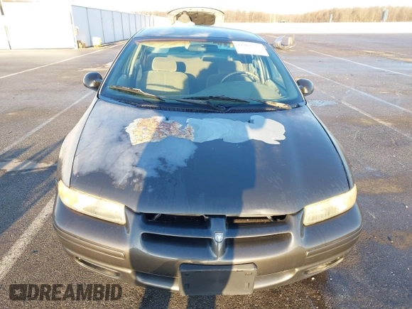 2000 Dodge Stratus z VIN 1B3EJ46X5YN133643, wystawiony jako IAAI lot #41863523 z przebiegiem 181 283 mil mil oraz . Historia ofert i sprzedaży dostępna na DreamBid. Obrazek 6.