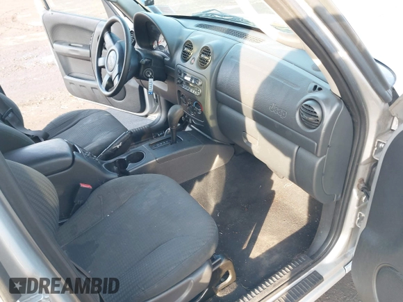 2002 Jeep Liberty Sport with VIN 1J4GL48K32W131467, listed as a IAAI auction lot 41485096 with 139,407 mi miles. Bid and sale history available at carsss.com. Image 5.