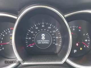 2014 Kia Optima LX with VIN 5XXGM4A72EG260072, listed as a IAAI auction lot 42109844 with 167,910 mi miles and . Bid and sale history available at carsss.com. Image 7.