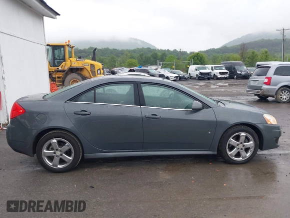 2009 Pontiac G6 1SB z VIN 1G2ZJ57B494247783, wystawiony jako IAAI lot #42309071 z przebiegiem 124 865 mil mil oraz . Historia ofert i sprzedaży dostępna na DreamBid. Obrazek 13.