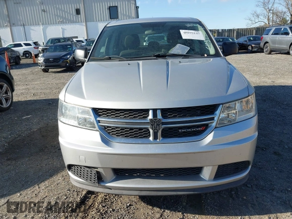 2013 Dodge Journey American Value with VIN 3C4PDCAB3DT610374, listed as a IAAI auction lot 40899147 with 133,386 mi miles and . Bid and sale history available at DreamBid. Image 6.