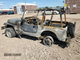 1992 Jeep Wrangler z VIN 2J4FY19P5NJ502467, wystawiony jako Copart lot #77054933 z przebiegiem Nie podano mil oraz Czysty tytuł • Clean title. Historia ofert i sprzedaży dostępna na DreamBid. Obrazek 2.
